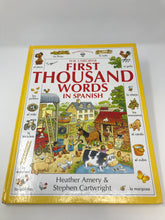 Load image into Gallery viewer, First Thousand Words in Spanish - Usborne (Used - Good) - Little Green Schoolhouse Books